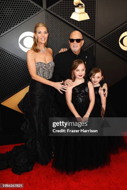 Alexis Roderick, Della Rose Joel, Billy Joel, and Remy Anne Joel attend the 66th GRAMMY Awards at Crypto.com Arena on February 04, 2024 in Los...