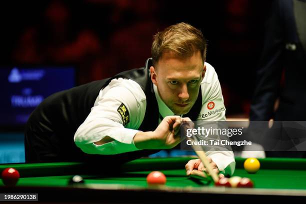 Judd Trump of England plays a shot in the Final match against Si Jiahui of China on day 7 of 2024 BetVictor German Masters at Tempodrom on February...