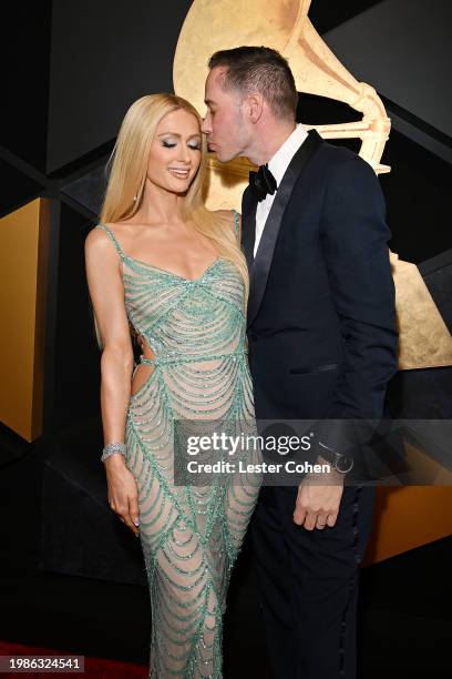 Paris Hilton and Carter Reum attend the 66th GRAMMY Awards at Crypto.com Arena on February 04, 2024 in Los Angeles, California.