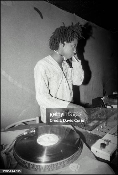 Sean Oliver of Rip Rig And Panic djing at the Hot Sty Club, London 6 June 1983.