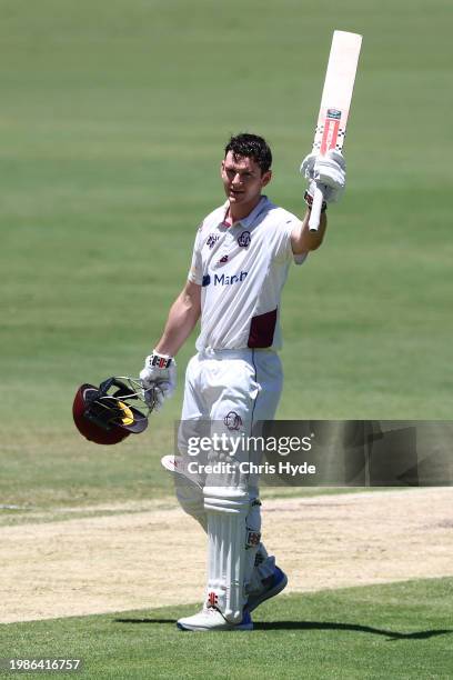 Jack Clayton of Queensland celebrate a century during the Sheffield Shield match between Queensland and Tasmania at The Gabba, on February 05 in...