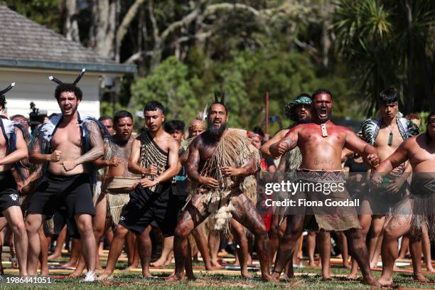 Maori warriors prepare to welcome the New Zealand government representatives including Prime Minister Christopher Luxon at Te Whare Rūnanga during a...