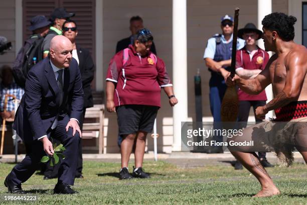New Zealand Prime Minister Christopher Luxon accepts a wero or challenge at Te Whare Rūnanga during a pōwhiri on February 05, 2024 in Waitangi, New...