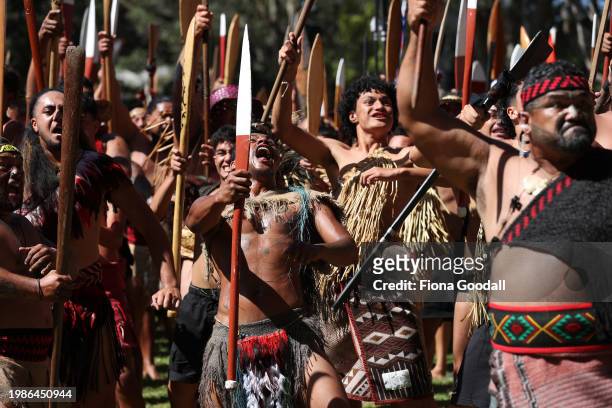 Maori warriors welcome New Zealand government representatives including Prime Minister Christopher Luxon at Te Whare Rūnanga during a pōwhiri on...