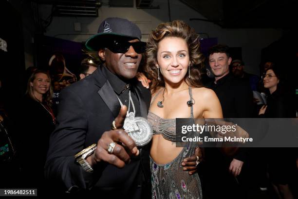 Flavor Flav and Miley Cyrus attend the 66th GRAMMY Awards at Crypto.com Arena on February 04, 2024 in Los Angeles, California.