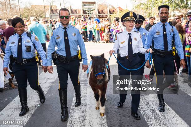 New Orleans Police chief Anne Kirkpatrick walks with The Mystic Krewe of Barkus parade in the French Quarter during 2024 Mardi Gras on February 04,...