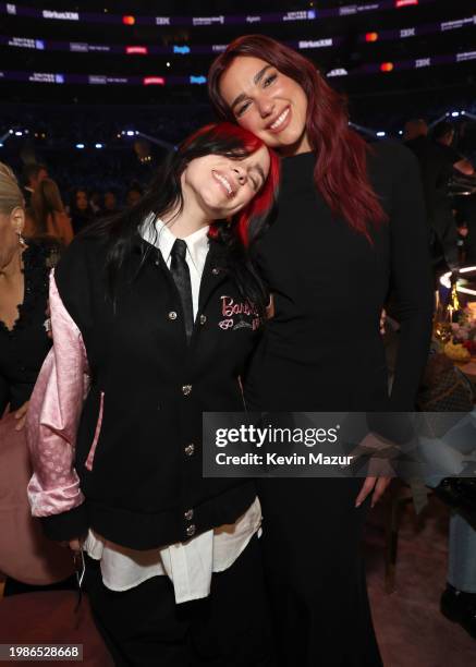 Billie Eilish and Dua Lipa attend the 66th GRAMMY Awards at Crypto.com Arena on February 04, 2024 in Los Angeles, California.