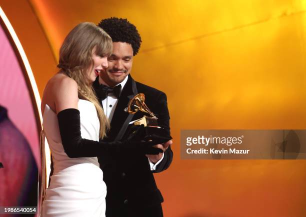 Taylor Swift accepts the Best Pop Vocal Album award for “Midnights” from Trevor Noah onstage during the 66th GRAMMY Awards at Crypto.com Arena on...
