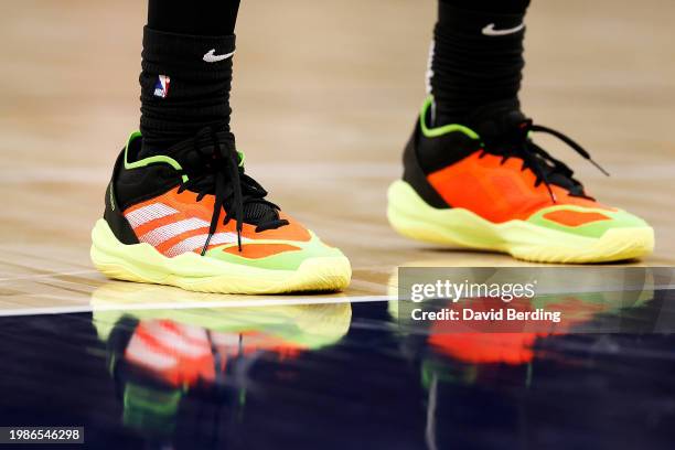 View of the Adidas sneakers worn by Jalen Green of the Houston Rockets against the Minnesota Timberwolves in the second quarter at Target Center on...