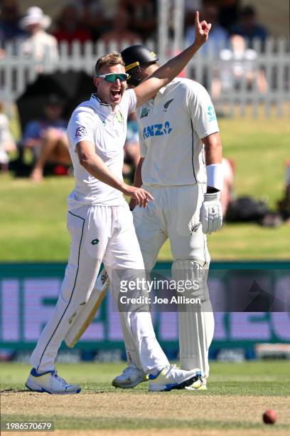 Neil Brand of South Africa celebrates after dismissing Mitchell Santner during day two of the First Test in the series between New Zealand and South...