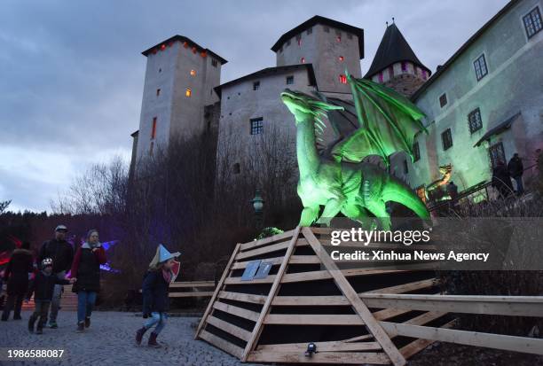 People visit "Game of Dragons" light show at Lockenhaus castle in Burgenland, Austria, on Feb. 4, 2024. The light show, featuring over 20 different...