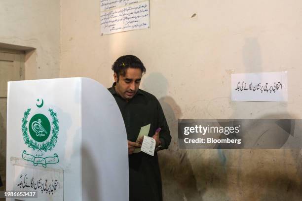 Bilawal Bhutto Zardari, chairman of Pakistan Peoples Party and former foreign minister, casts a ballot at a polling station in Lakarna, Pakistan, on...