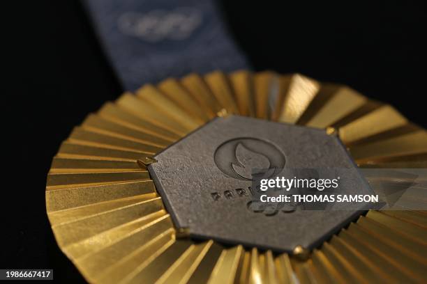 This photograph taken on January 30, 2024 in Paris shows the upcoming Paris 2024 Olympics gold medal designed by Fench luxury jewellery house...