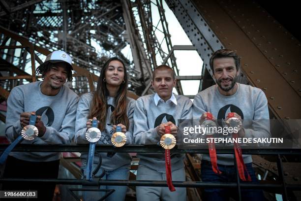 Olympics French sportsmen Arnaud Assoumani, Marie Patouillet, Sara Balzer and French President of the Paris Organising Committee of the 2024 Olympic...