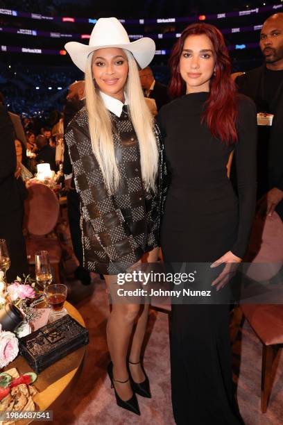 Beyoncé and Dua Lipa attend the 66th GRAMMY Awards at Crypto.com Arena on February 04, 2024 in Los Angeles, California.
