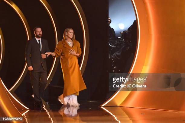 Rene-Charles Angelil and Celine Dion arrive onstage during the 66th GRAMMY Awards at Crypto.com Arena on February 04, 2024 in Los Angeles, California.