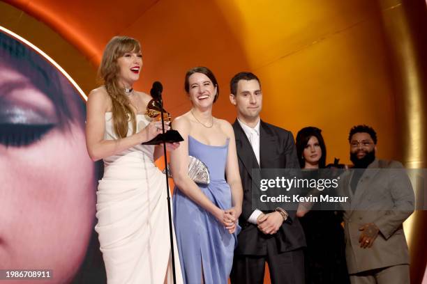 Taylor Swift accepts the Album Of The Year award for "Midnights" with Laura Sisk, Jack Antonoff and Lana Del Rey onstage during the 66th GRAMMY...