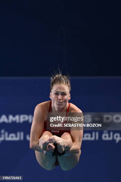 South Africa's Julia Vincent competes in the preliminary round of the women's 3m springboard diving event during the 2024 World Aquatics...