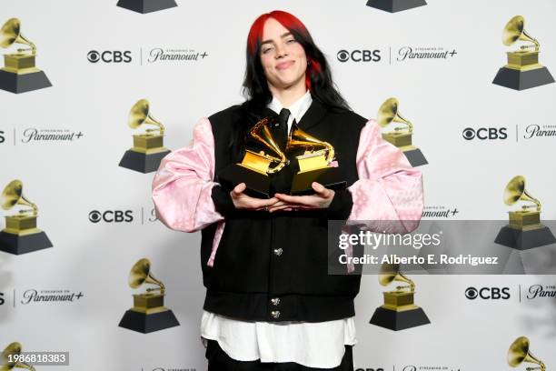 Billie Eilish, winner of the "Best Song Written for Visual Media" and "Song of the Year" awards for “What Was I Made For?", poses in the press room...