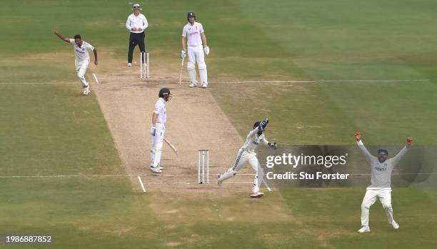 India bowler Ravi Ashwin celebrates after taking the wicket of England batsman Ollie Pope caught at slip by Rohit Sharma during day four of the 2nd...