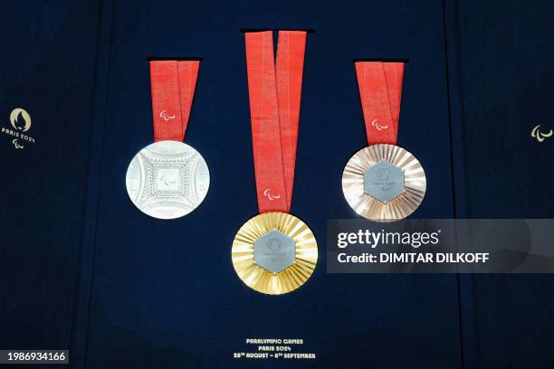 This photograph taken in Paris on February 8 shows the Paralympic medals during the unveiling of the Olympic and Paralympic medals for the Paris 2024...