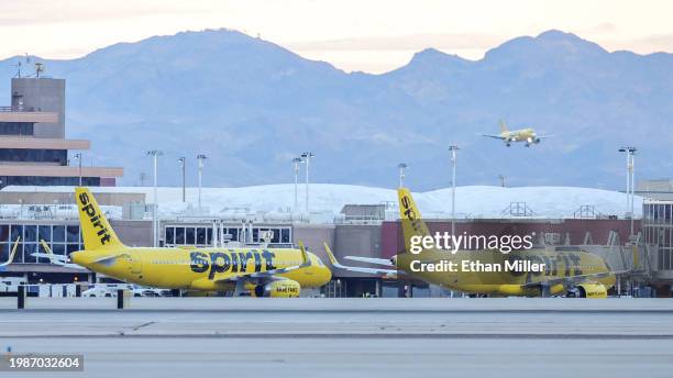 Spirit Airlines jets are parked at a gate at Harry Reid International Airport on February 04, 2024 in Las Vegas, Nevada. An appeals court said on...
