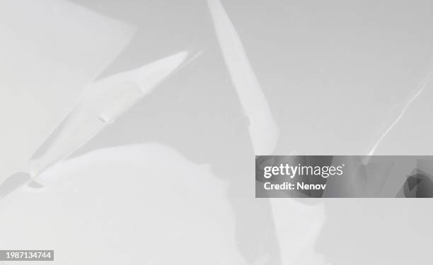 image of hard plastic packaging - scrunched plastic bag stock pictures, royalty-free photos & images