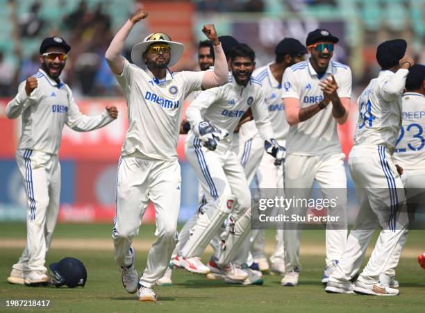 India fielder Shreyas Iyer celebrates with team mates after running out England captain Ben Stokes with a direct throw and given after a review...