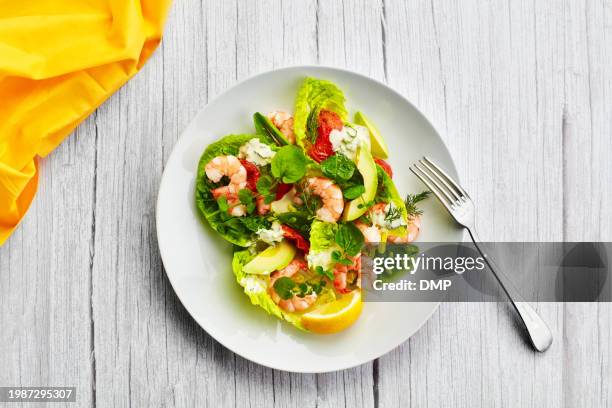 food, salad and above of seafood on plate for lunch, supper and meal preparation on kitchen table. ingredients, dinner and top view of shrimp, cuisine or dish for wellness, nutrition and healthy diet - paleo diet stock pictures, royalty-free photos & images