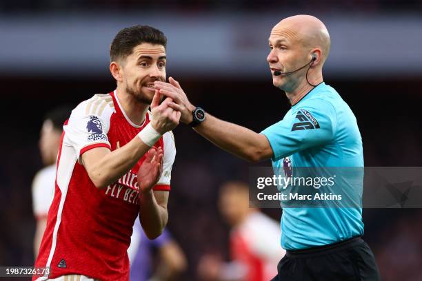Referee Anthony Taylor with Jorginho of Arsenal during the Premier League match between Arsenal FC and Liverpool FC at Emirates Stadium on February...