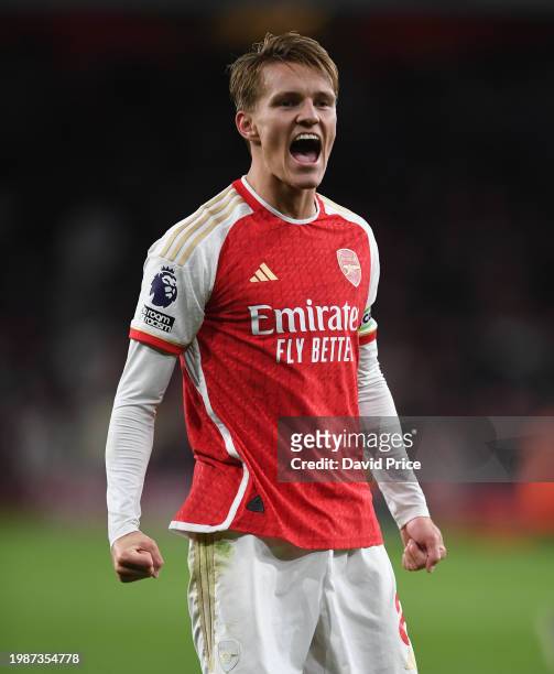 Martin Odegaard of Arsenal celebrates after the Premier League match between Arsenal FC and Liverpool FC at Emirates Stadium on February 04, 2024 in...