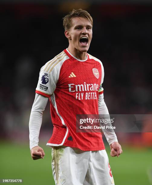 Martin Odegaard of Arsenal celebrates after the Premier League match between Arsenal FC and Liverpool FC at Emirates Stadium on February 04, 2024 in...