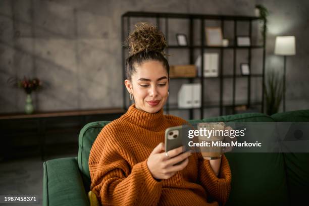 young woman drinking coffee in the morning - woman heat stock pictures, royalty-free photos & images