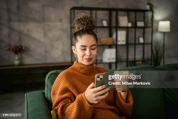 young woman drinking coffee in the morning - robe stock pictures, royalty-free photos & images