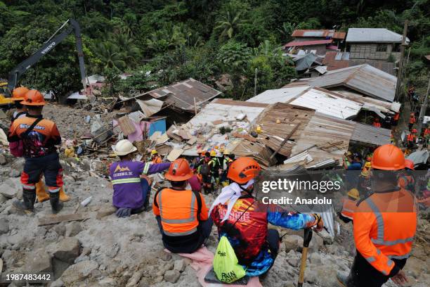 Rescue teams continue search and rescue operations for missing miners at the landslide hit village of Masara in Municipality of Maco, Davao de Oro,...