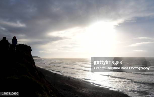 silhouettes at st bees - st bees stock pictures, royalty-free photos & images