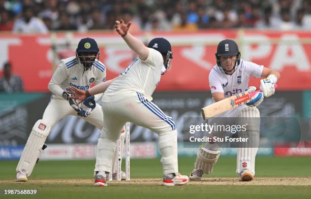 India wicketkeeper KS Bharat looks on as England batsman Ollie Pope drives during day four of the 2nd Test Match between India and England at...