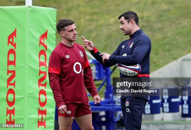 George Ford of England speaks with Felix Jones, Coach of England, during the England Rugby Training session at Pennyhill Park on February 05, 2024 in...