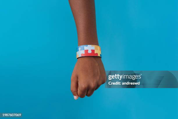 autism bracelet - bracelet stock pictures, royalty-free photos & images