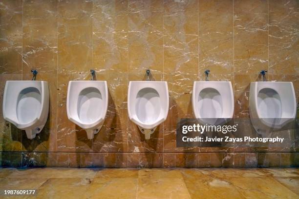Uninal 634 Men At Urinals Stock Photos, High-Res Pictures, and Images - Getty ...