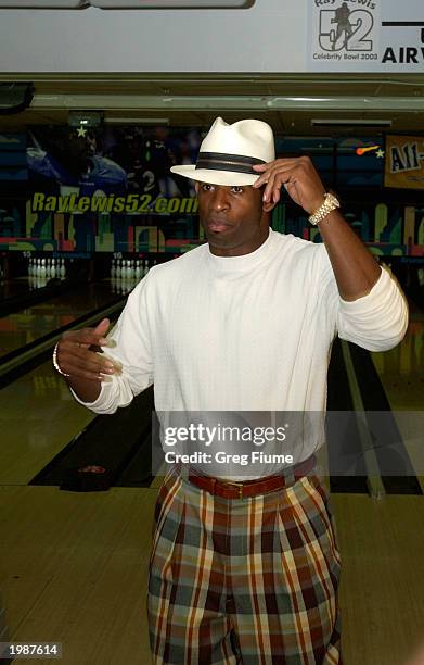 Deion Sanders participates in the Ray Lewis Foundation Charity Bowling Tournament May 9, 2003 at the Brunswick Normandy Lanes in Ellicott City,...