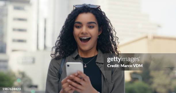 phone, wow and excited woman in city with reaction to good news, bonus or promotion with text message communication. app, contact and social media and young person surprised by alert or notification - rewards program stock pictures, royalty-free photos & images