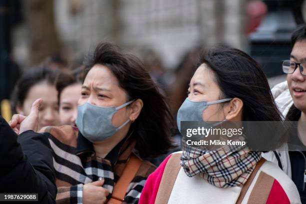 People wearing face masks to protect against Coronavirus / Covid-19 on 5th February 2024 in London, United Kingdom. The usage of face coverings in...