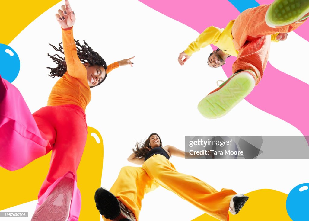 Looking up at happy people dancing