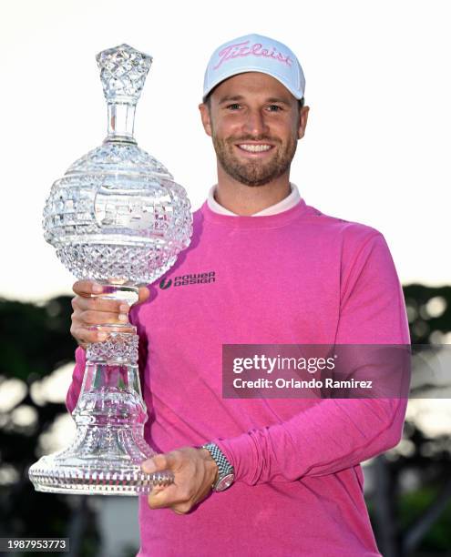 Wyndham Clark of the United States poses with the trophy after winning the AT&T Pebble Beach Pro-Am at Pebble Beach Golf Links on February 05, 2024...