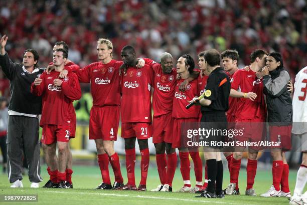 May 25: Liverpool players Harry Kewell, Dietmar Hamann, Jamie Carragher, Sami Hyypia, Djimi Traore, Djibril Cisse, Luis Garcia, Steven Gerrard, Xabi...