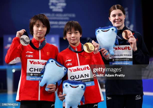 Silver Medalist, Yuxi Chen of Team People's Republic of China, Gold Medalist, Hongchan Quan of Team People's Republic of China and Bronze Medalist,...