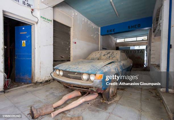 Brand New 1970s Toyota imported car from Japan covered in dust at abandoned dealership in the Buffer Zone on December 28, 2023 in Nicosia, Cyprus....