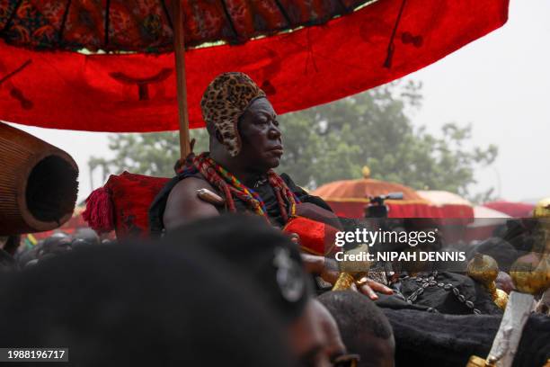 Otumfuo Osei Tutu II , Ghana's Asante king, arrives at the Manhyia Palace in Kumasi, Ghana, on February 8, 2024 during the permanent return of...