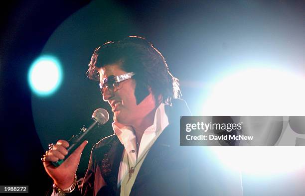 An Elvis Presley impersonator performs at "A Weekend with the King" gathering to remember and honor the late rock star Elvis Presley on May 9, 2003...